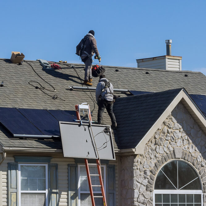 Technician,Workers,Installing,Alternative,Energy,Photovoltaic,Solar,Panels,On,House