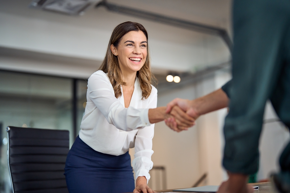 woman and man handshake