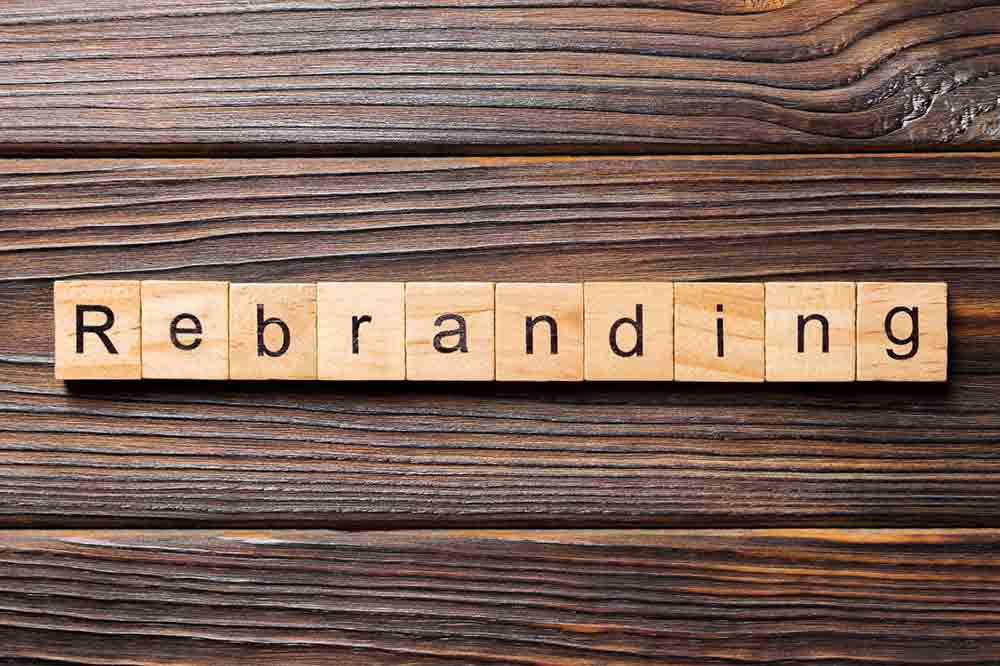 “rebranding” spelled in alphabet blocks