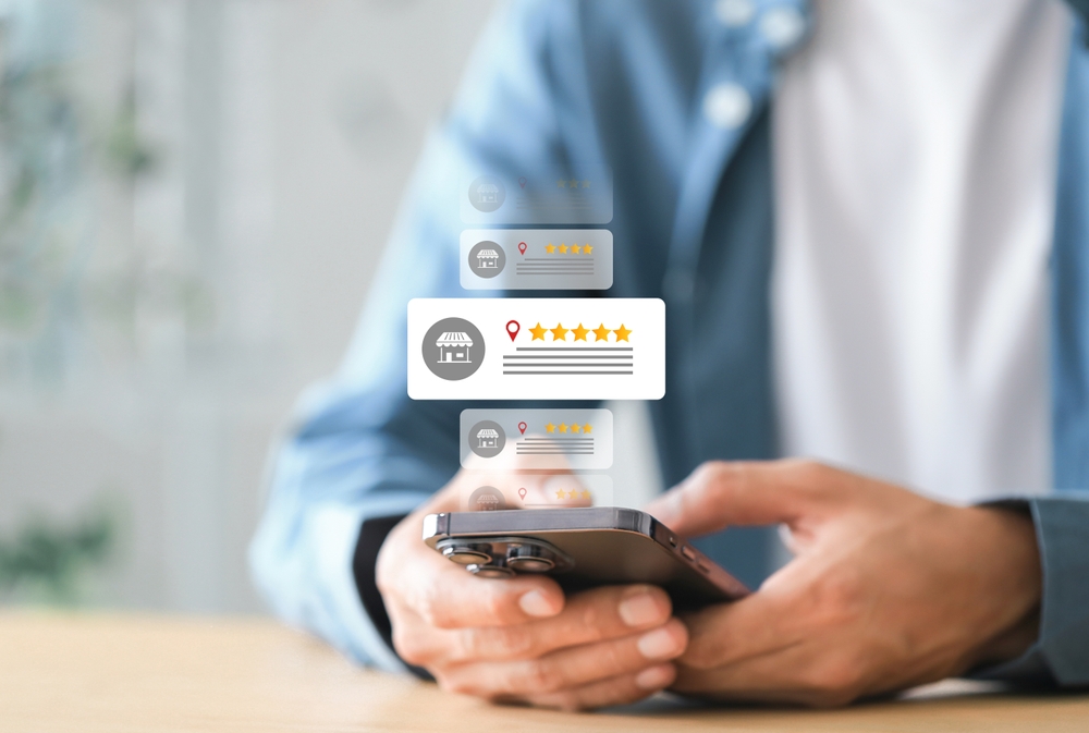 smartphone displaying customer review posts and star ratings