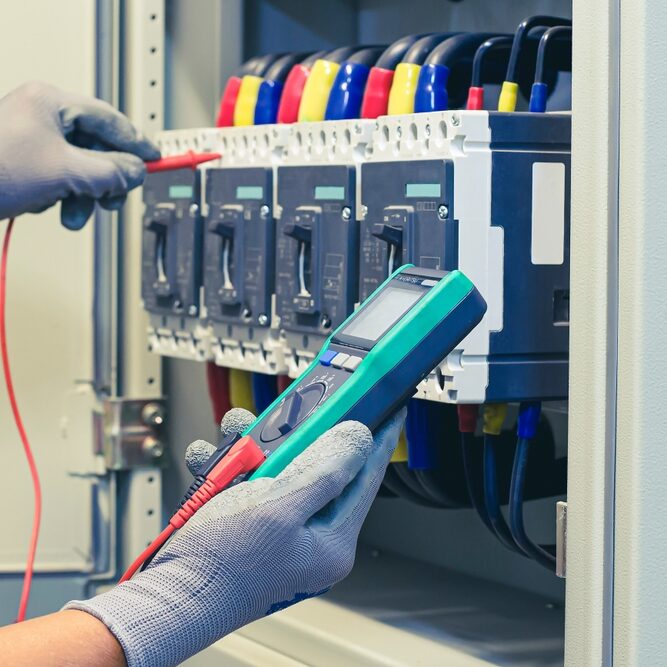 Electrical,Engineer,Tests,The,Operation,Of,The,Electric,Control,Cabinet